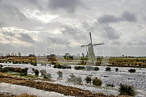 Windmill under a dramatic sky