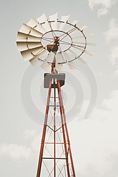 Windmill in vertical format using desaturated tones photo