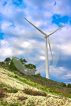 Windmill, wind generator turbine in the sky