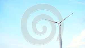 Windmill Wind power technology - low angle view on Energy Production. Background with wind turbine