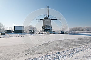 Windmill in winter scenery