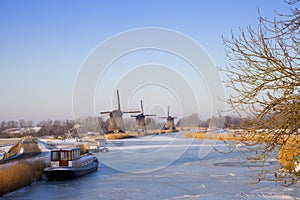 Windmill in winter time with snow