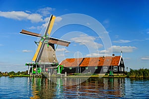 Windmill on Zaan river at Zaanse Schans photo