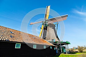 Windmill in Zaanse Schans, traditional village near Amsterdam, Holland