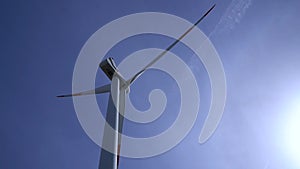 windmills against blue sky