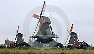 Traditional zaanse schans windmill in The Netherlands. Unique beautiful and wild European city.