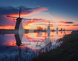 Windmills at beautiful sunrise in Kinderdijk, Netherlands