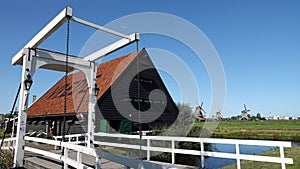 Windmills, bridge and Vrede souvenir shop at Zaanse Schans, the Netherlands