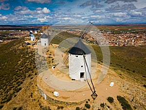 Windmills and castle of Consuegra photo