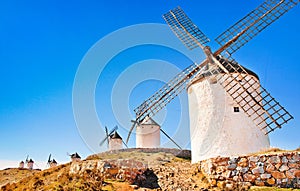 Windmills in Consuegra at sunset, Andalusia, Spain photo