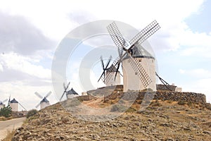 Picturesque windmills of Don Quichot in Consuegra, Spain photo