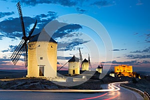 Windmills at dusk, Consuegra, Castile-La Mancha, Spain photo