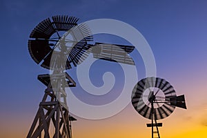 Windmills at dusk, Texas