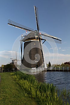 Windmills on dutch countryside