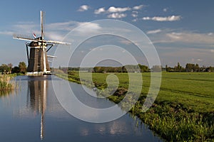 Windmills on dutch countryside