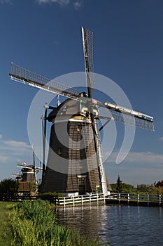 Windmills on dutch countryside