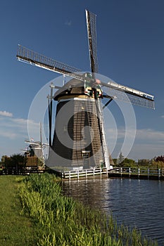 Windmills on dutch countryside