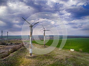 Windmills for electric power - Energy Production with clean and Renewable Energy - aerial drone shot