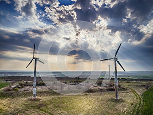 Windmills for electric power - Energy Production with clean and Renewable Energy - aerial drone shot
