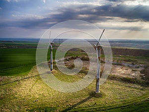 Windmills for electric power - Energy Production with clean and Renewable Energy - aerial drone shot