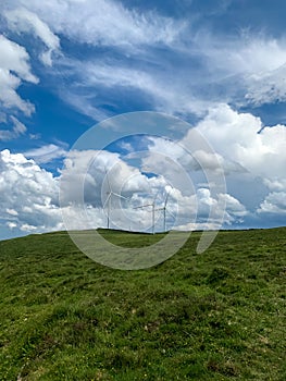 Windmills Energy Farm at the top of a mountain in Spain. Wind Turbines