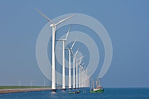 Windmills and fishery ship photo