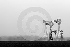 Windmills in the fog