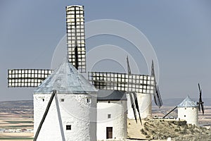 Windmills or giants on the Don Quixote tourist route among the farms photo