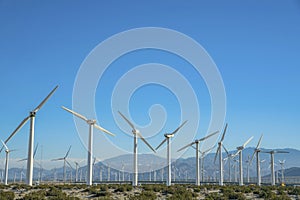 Windmills or high wind turbines that generates renewable electricity