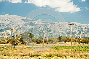 Windmills on Lasithi Plateau, Crete Greece photo