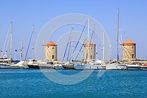 Windmills in mandraki port in Rhodes, Dodecanese