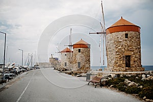 Windmills in the Mandraki port of Rhodes, Greece