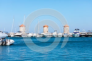 Windmills in the Mandraki port of Rhodes, Greece