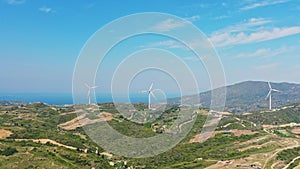 Windmills producing renewable energy from wind