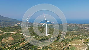 Windmills producing renewable energy from wind