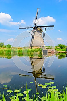 The windmills and the reflection on water in Kinderdijk in Rotterdam, Netherlands