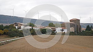 Windmills spinning on the hills, spanish countryside