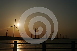 Windmills at sunset