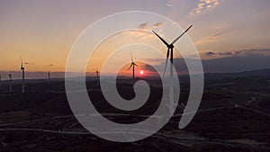 Windmills at sunset, aerial photo wind energy photo