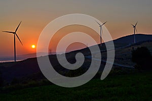 Windmills at sunset in Banat (Romania)