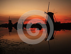 Windmills at sunset in Holland