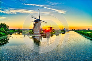 Windmills at sunset in Kinderdijk, The Netherlands