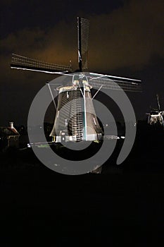 Windmills of the Tweemanspolder in Zevenhuizen iluminated by lights which happens one week per year.