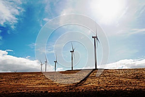 Windmills on a vast plain