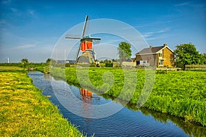 Windmills and water canal in Kinderdijk, Holland