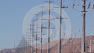 Windmills on wind farm, wind mill energy generators. Desert windfarm, USA.