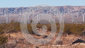 Windmills on wind farm, wind mill energy generators. Desert windfarm, USA.