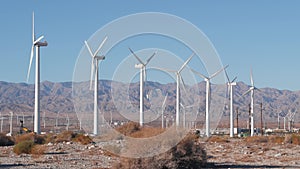 Windmills on wind farm, wind mill energy generators. Desert windfarm, USA.