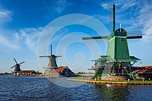 Windmills at Zaanse Schans in Holland on sunset. Zaandam, Nether