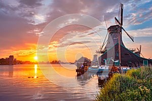 Windmills at Zaanse Schans in Holland on sunset. Zaandam, Nether